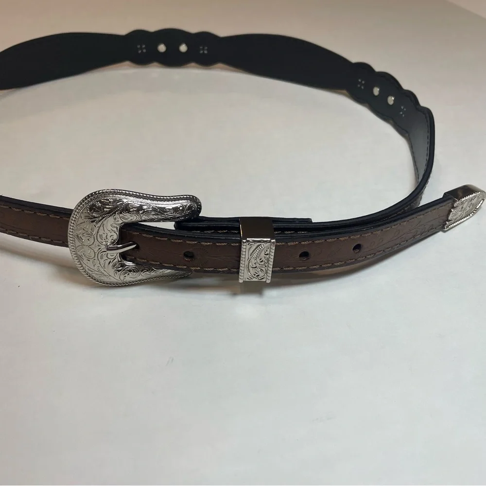 Belt women’s western with silver accents. Floral etched design. 43” long. Used. - Picture 8 of 8